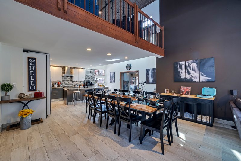 Dining room and kitchen area set up for a group meal at Waterfall Wonder.